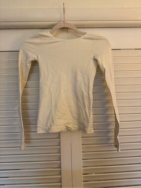Free People Women's Long-Sleeve Low Back seamless soft stretchy shirt in Cream